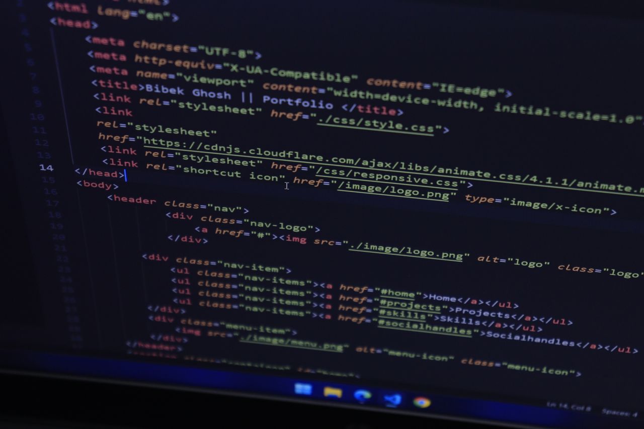 project-02-a High-resolution close-up of HTML code displayed on a computer screen, perfect for technology themes.